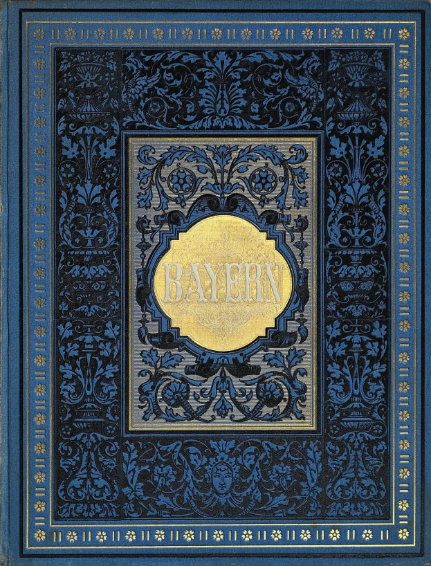 Blau-goldenes Buch mit dem Wort 'Bayern' auf dem Cover, verziert mit aufwändigen Dekorationen.