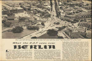 Schwarz-weißes Zeitungsbild, das eine Stadtlandschaft mit Gebäuden, Bäumen und Fahrzeugen zeigt, begleitet von Text.